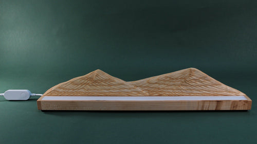 Wooden mountain design lamp with no illumination, natural lighting