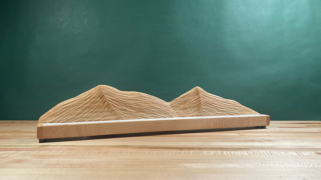 Wood carved mountain range lamp with lighting turned off