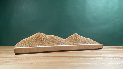 Wood carved mountain range lamp with lighting turned off