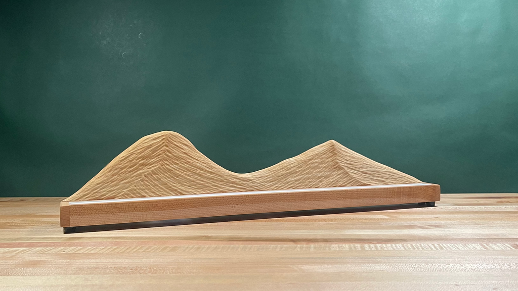 Wood carved mountain range lamp with lighting turned off